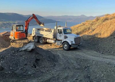 Godard-Excavating-house-building-project-overlooking-lake