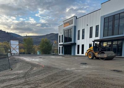 Godard-Excavating-new-parking-lot-prepped-with-steamroller