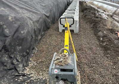 Godard-Excavating-placing-concrete-for-retaining-wall